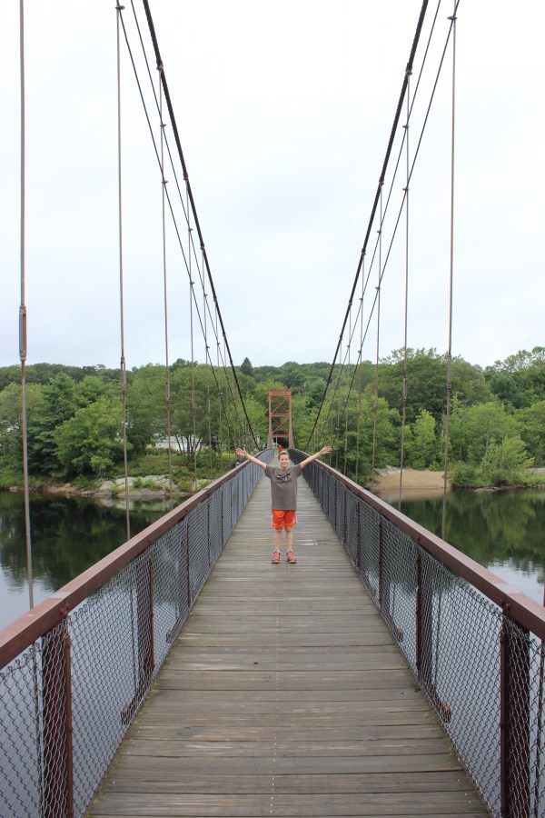 Swinging pedestrian bridge built by the John Roebling company