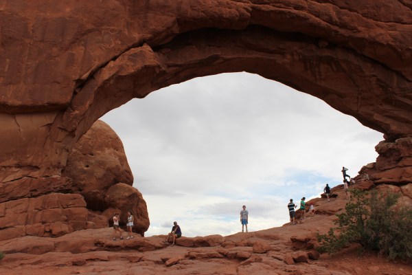 Sam stands beneath an arch called North Window